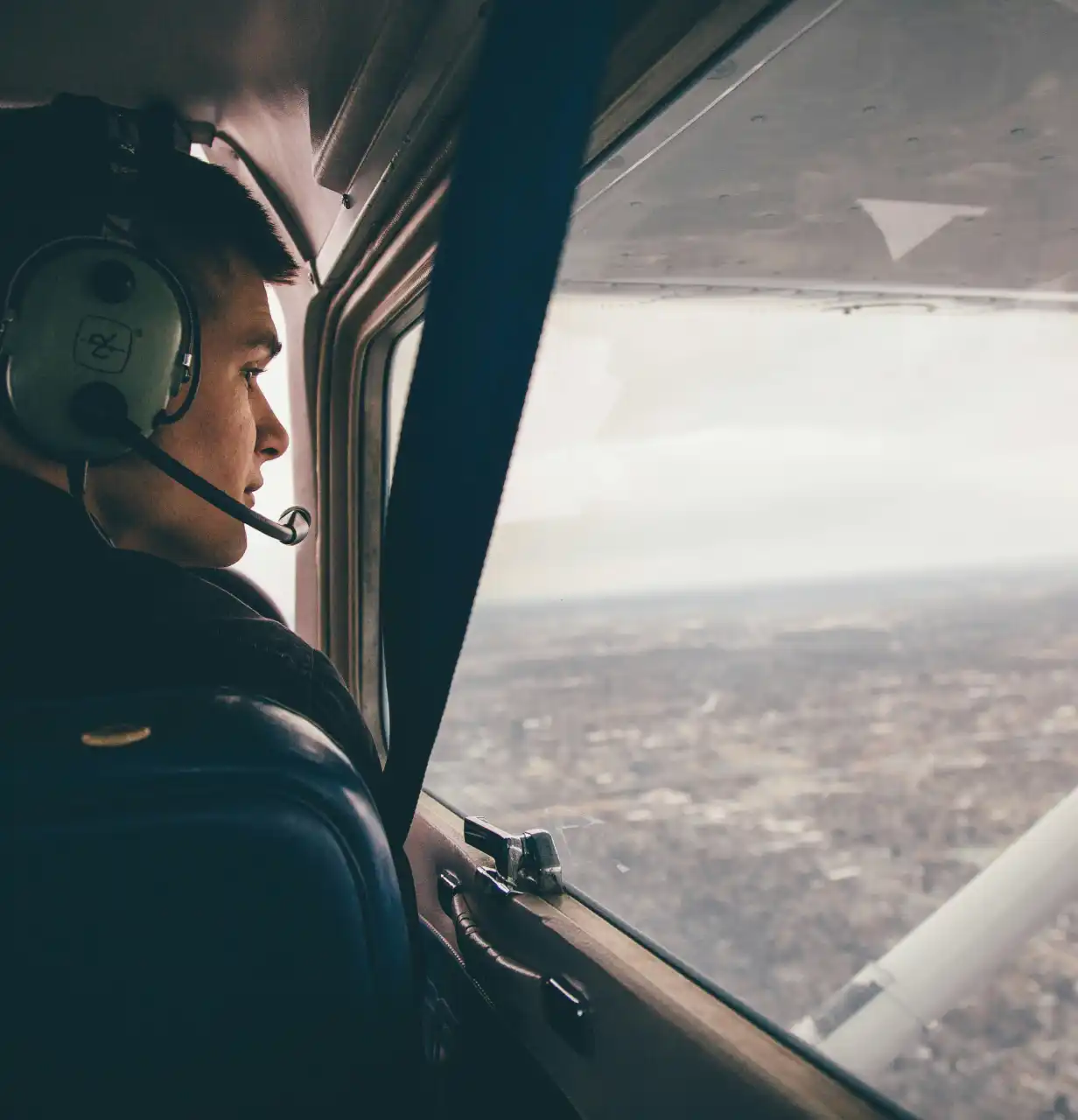 A view of the cockpit with a pilot